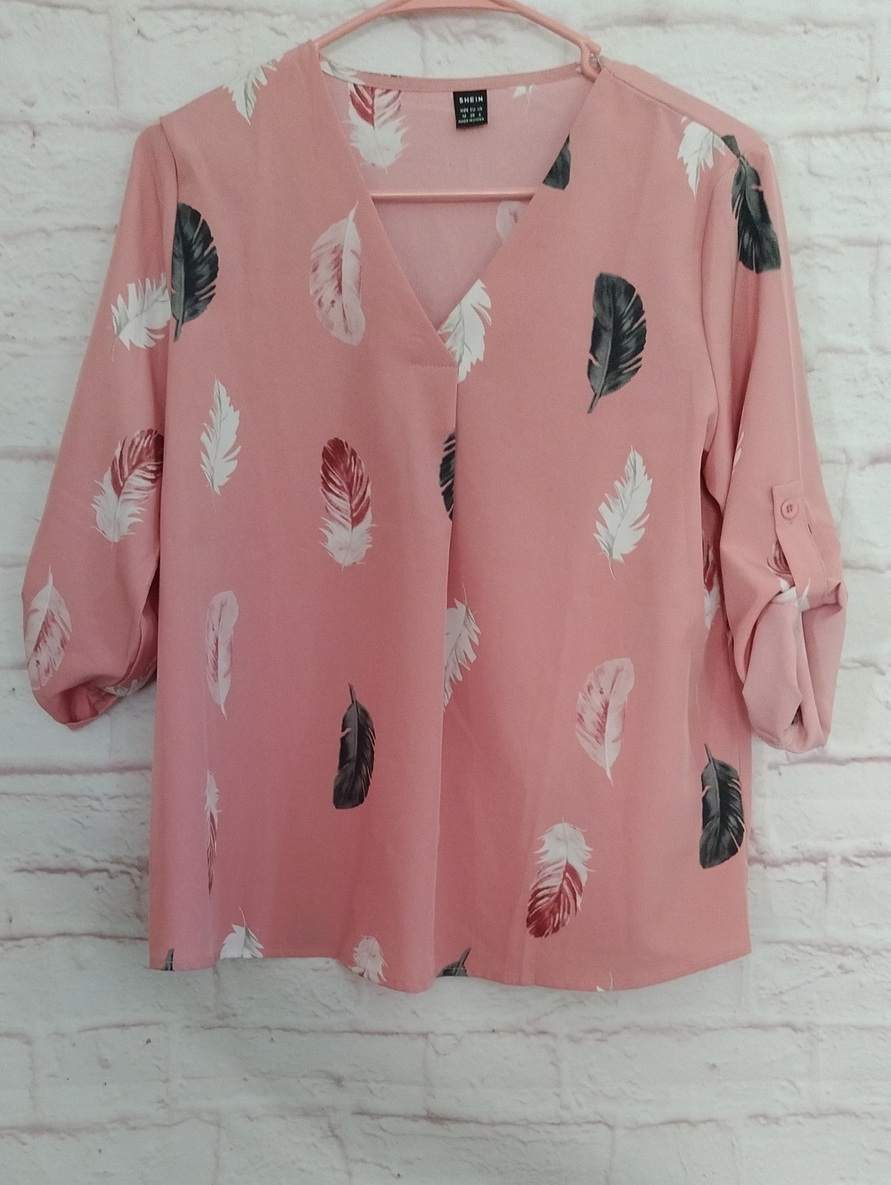 Pink Feather-Print V-Neck Blouse with Black and White Accents